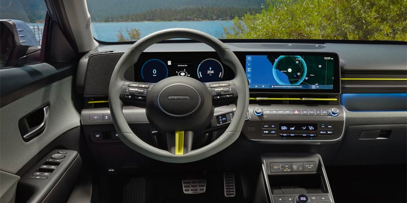 Modern car interior featuring a digital dashboard and steering wheel.