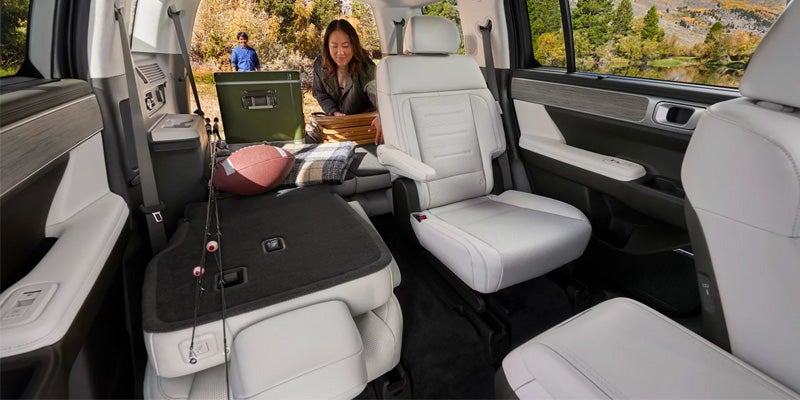 Interior view showing folded rear seats and storage capacity.
